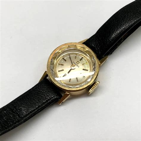 ladies solid gold omega watch|omega 14k gold watch women's.